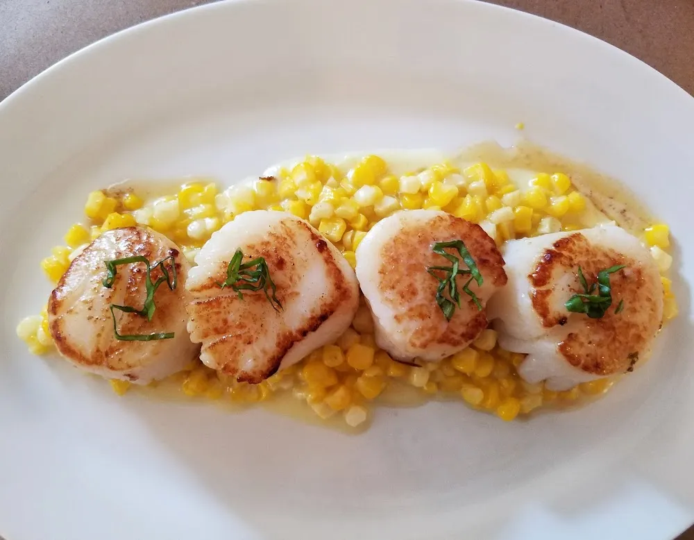 Panseared Scallops over Truffled Corn